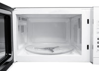 Danby 0.9 Cu. Ft. Countertop Microwave - White - DBMW0921BWW | Four à micro-ondes de comptoir Danby de 0,9 pi3 - blanc - DBMW0921BWW | DBMW09WW